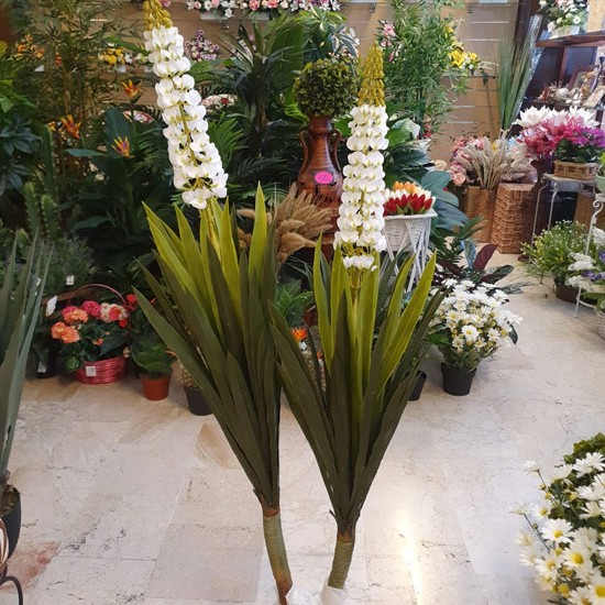 yuca artificial con flor para envío a domicilio